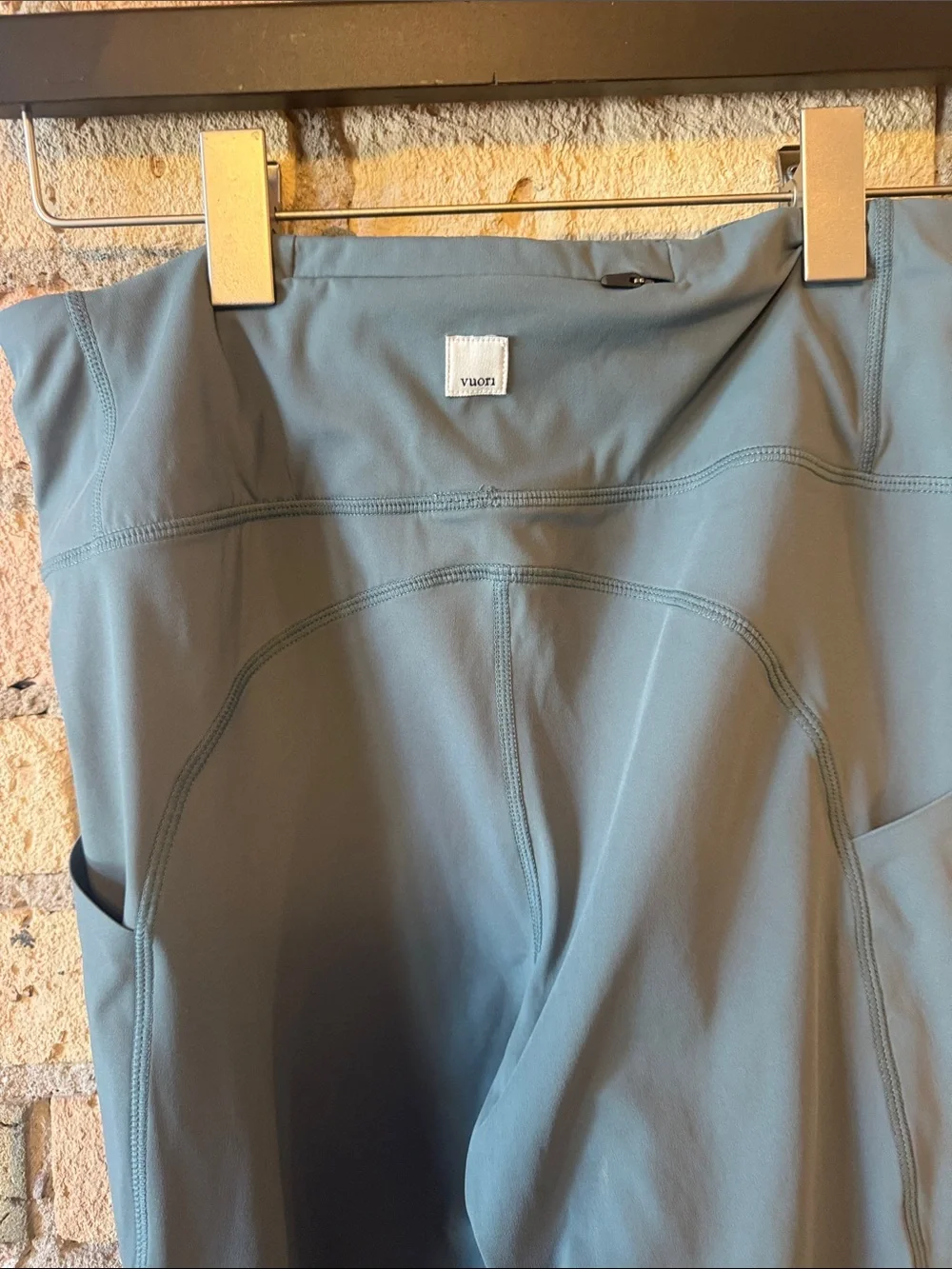 Vuori High-Waist Performance Leggings - Slate Blue with zipper pocket on back